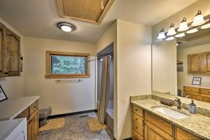 a bathroom with a sink and a shower in it at The Oakwood house in Rising Fawn +25 photos