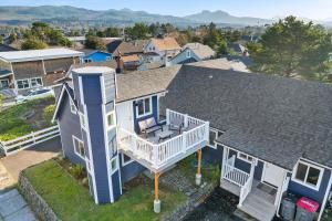 an aerial view of a house with a balcony at Seaside Castle in Seaside