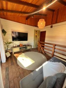 Μια τηλεόραση ή/και κέντρο ψυχαγωγίας στο Casa de praia nova a 500m do mar!