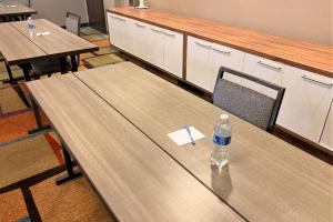 a bottle of water sitting on top of a table at Fairfield Inn Las Vegas Convention Center in Las Vegas +22 photos