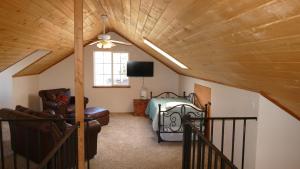 Μια τηλεόραση ή/και κέντρο ψυχαγωγίας στο Spacious 6-bedroom log cabin