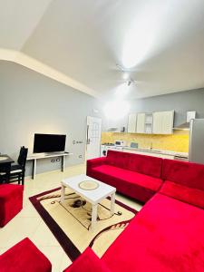 TV a/nebo společenská místnost v ubytování THE DOMI Apartments