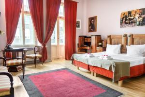 Posteľ alebo postele v izbe v ubytovaní Chopin Boutique + 37 fotografií