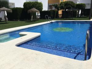 The swimming pool at or close to Casa Veratense Atico Vera Naturista is 100 feelgood in Vera Playa