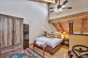 a bedroom with a bed and a ceiling fan at Mv8 lakeview across from Heavenly in Stateline