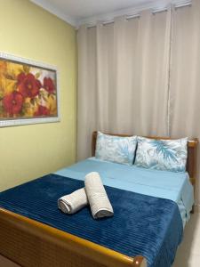 Giường trong phòng chung tại Casa Da Praia