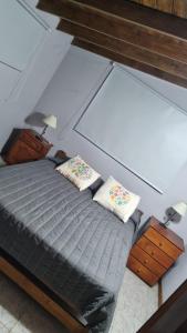 コスタ・デル・エステにあるCosta del Este 1のベッド1台が備わる客室です。