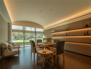 Posezení v ubytování Yibo Jinling Hotel Moganshan