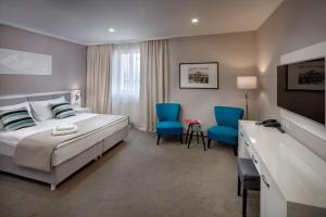 Posteľ alebo postele v izbe v ubytovaní Hotel Florenc