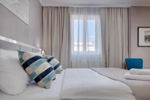 Posteľ alebo postele v izbe v ubytovaní Hotel Florenc