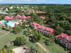 an aerial view of a resort with a pool at Ocean dream in Sainte-Anne