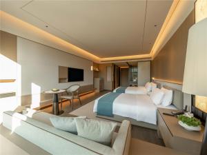 TV a/nebo společenská místnost v ubytování Yibo Jinling Hotel Moganshan