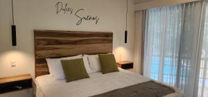 Postel nebo postele na pokoji v ubytování Hotel Evasión
