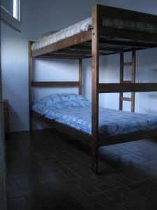 En eller flere senge i et værelse på Alquiler de temporada Santa Clara