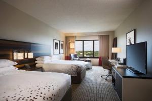 Postel nebo postele na pokoji v ubytování Renaissance Austin Hotel