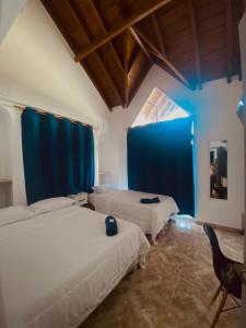 Ένα ή περισσότερα κρεβάτια σε δωμάτιο στο Hotel Boutique DL