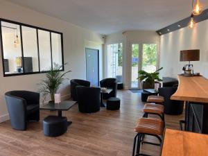 Posezení v ubytování Hotel Les Nevons