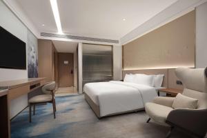 En eller flere senger på et rom på Doubletree By Hilton Altay Fuyun