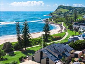 a view of a beach with houses and the ocean at Karingal 1 in Lennox Head +10 photos
