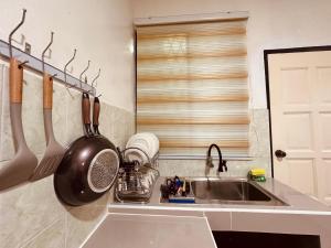 Kuchyň nebo kuchyňský kout v ubytování Alana Guesthouse