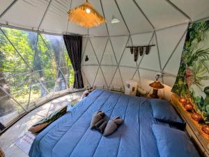Postel nebo postele na pokoji v ubytování Vanara Bungalows