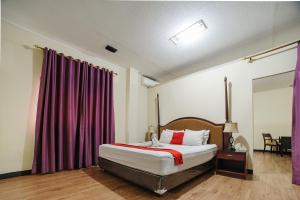 Voodi või voodid majutusasutuse RedDoorz Plus @ Jalan Raden Intan Lampung toas