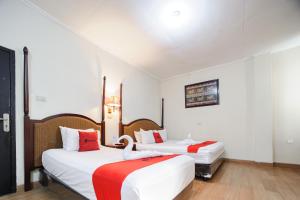 Voodi või voodid majutusasutuse RedDoorz Plus @ Jalan Raden Intan Lampung toas