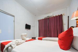 Voodi või voodid majutusasutuse RedDoorz Plus @ Jalan Raden Intan Lampung toas