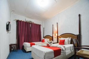 Voodi või voodid majutusasutuse RedDoorz Plus @ Jalan Raden Intan Lampung toas