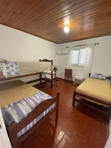 Postel nebo postele na pokoji v ubytování Dpto Apart Berutti