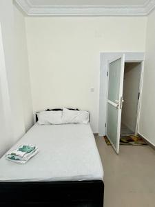 Postel nebo postele na pokoji v ubytování Essentiel 2
