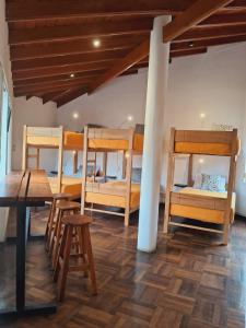 Ένα ή περισσότερα κρεβάτια σε δωμάτιο στο Temazcal Hostel