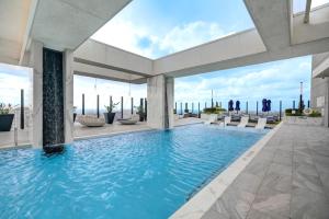a rendering of a swimming pool in a building at Hanover BLVD Place in Houston