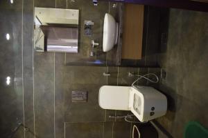 Un baño de Sukhdham Yatri Bhavan 9 fotos más