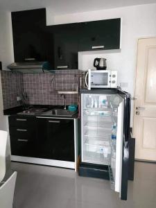 Kuchyň nebo kuchyňský kout v ubytování Art on the beach 49