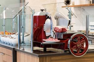 a red car on display in a display case at AC Hotel by Marriott Louisville Downtown in Louisville