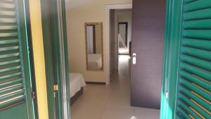 A bed or beds in a room at Residenza S.Event B&B