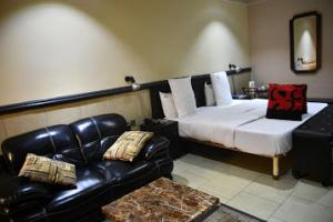 Voodi või voodid majutusasutuse Choice Gate Hotel-Business Double toas