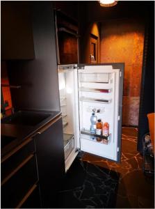 Una cocina o kitchenette en Chalet with panoramic views of the mountains of the Oberland and Lake Thun