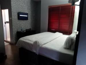 Postel nebo postele na pokoji v ubytování All Seasons Hotel - Executive