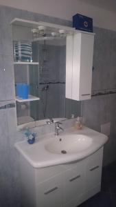 Kúpeľňa v ubytovaní Apartment Radalj