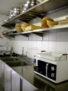Dapur atau dapur kecil di Outstanding chalet for groups south facing breathtaking views all year round