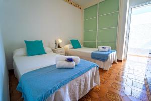 Postel nebo postele na pokoji v ubytování Beautiful Villa Duque With Pool Poris Tenerife South + 37 fotografií