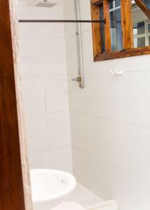 a bathroom with a sink and a toilet at Hb3 Double Room with private bathroom facing the sea in Cartagena de Indias
