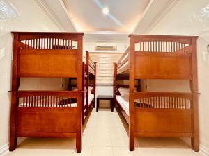 Postel nebo postele na pokoji v ubytování Alana Guesthouse