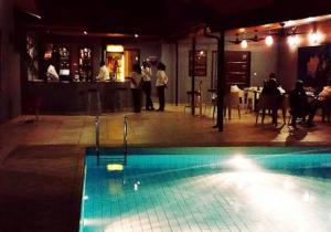 Bazén v ubytování Polo Court - Executive nebo v jeho okolí + 10 fotografií