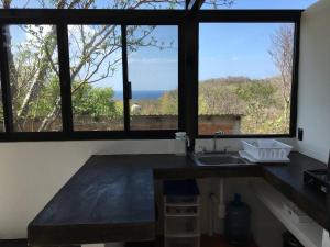 Η κουζίνα ή μικρή κουζίνα στο Double Bungalow With Partial Sea View, Full Kitchen +8 φωτογραφίες