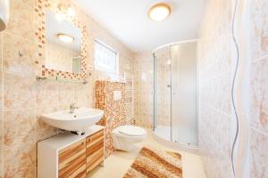 Kopalnica v nastanitvi Wellness Apartmány Andrea