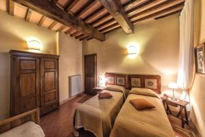 A bed or beds in a room at Holiday home in Antique Hamlet quoted in Dantes poem inferno
