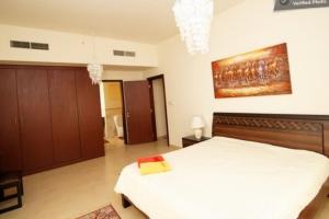 Letto o letti in una camera di 2br Beach front Sea View